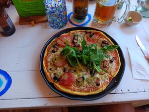 Pesto pizza with tomatoes and fresh basil at Vegan Town in Ajijic