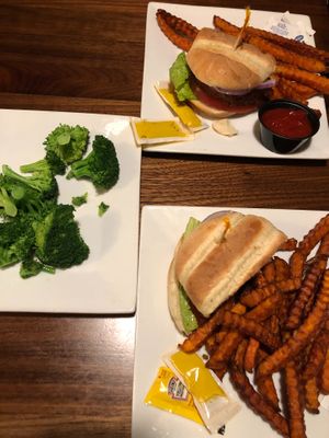 Beyond Burger, sweet potato fries and broccoli at Slippery Otter Pub in West Yellowstone