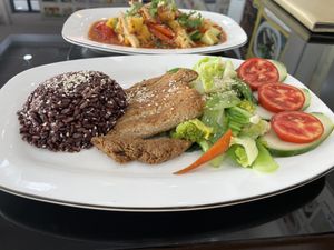 Grilled pork with rice, 60,000 kip  at Vegan Center Cafe in Vientiane