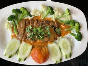 Duck volcano red curry sauce, 70,000 kip  at Vegan Center Cafe in Vientiane