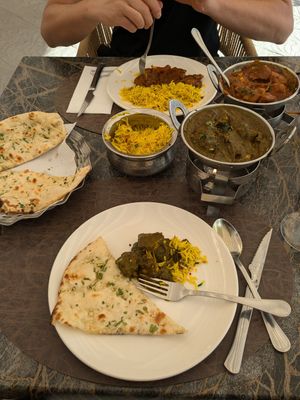 Garlic naan, garlic rice, saag and batli curry w soy meat at Bombay Babu - Calle Valencia in Tenerife