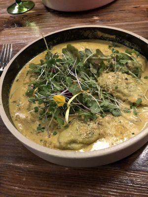 Agliotti - ravioli stuffed with spinach and cream sauce from cashews  at Don Vegan in Quebec