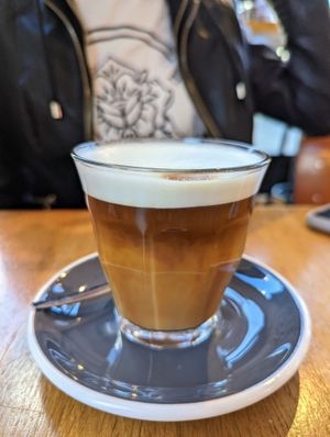 Macchiato latte with oat milk  at The Breakfast Club - Sloterdijk in Amsterdam