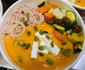 Rice spaghetti with cream of pumpkin and chickpeas, mixed vegetables, olives and feta at Nectare 2 in Bologna