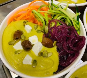 Vegetarian dish with purple sweet potato spaghetti at Nectare 2 in Bologna