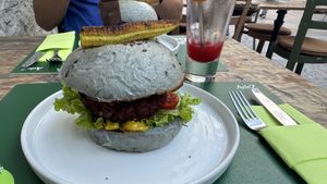 Beetroot burger with spirulina bun  at Pandora Greenbox in Split