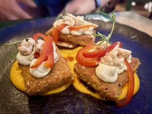 Vegan crispy fried tempeh with carrot purée and pickled veggies.  at Pandora Greenbox in Split