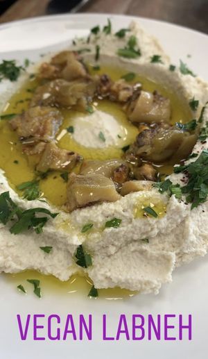 Vegan Labneh made from cashews topped with pickled eggplant  at Olive Press Eatery in Metuchen