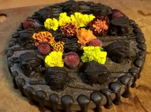 Raw Vegan Chocolate Celebration Edible Flower Cheesecake at Green Wave Cafe in Plantation