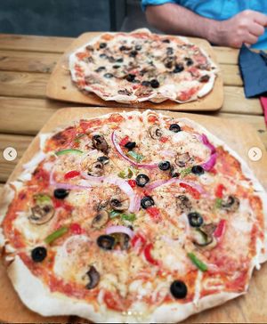 our pizzas at TerraPlana Café in Porto