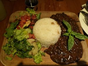 Guiso de porotos negros con arroz y ensalada surtida at Ecole in Pucon