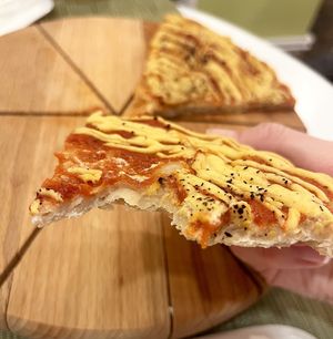 Unfortunately, the dough in Margherita pizza was not baked, it got stuck on the teeth... at Dr Veggie in Yerevan