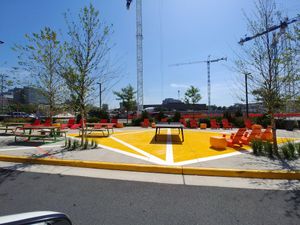 Across the street, ping-pong table and chairs to hang out at honeygrow in Reston