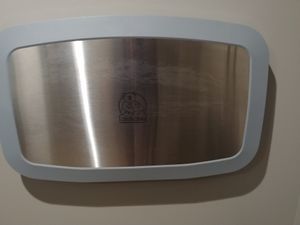 Baby changing station in restrooms at honeygrow in Reston