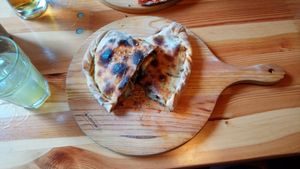Calzone, stuffed with spinach, vegan cheese, mushrooms and pesto at DogTown Lagos in Lagos