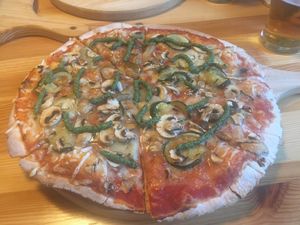 Vegan pesto, aubergine, courgette and mushroom pizza at DogTown Lagos in Lagos
