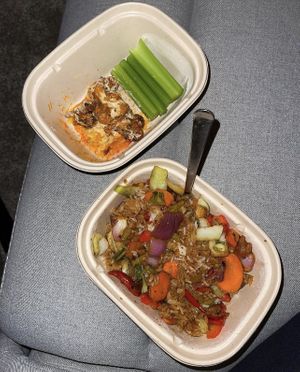 Vegan Buffalo cauliflower (half eaten LOL) and vegan Hunan Kung pao at Earls Kitchen + Bar in Edmonton