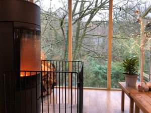 Most of the seating is chairs around tables but there’s a (leather 😞) sofa and chair by the fire. at St Nectan's Glen in Tintagel