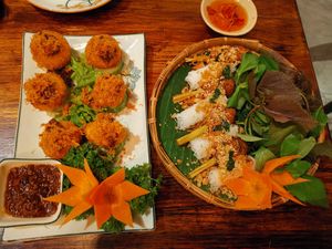 On the right the amazing Woven noodles w Grilled Nem, on the left Three-layered Tofu at Shamballa Vegetarian Restaurant & Tea House in Ho Chi Minh City