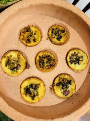 Banh kot, regional specialty of rice paper clay pot roared mini crepes filled with mushroom, wrap in lettuce and greens and dip in sauce  at Shamballa Vegetarian Restaurant & Tea House in Ho Chi Minh City