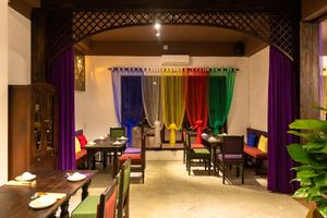 Five-coloured curtains of the Buddha represents peace, mercy, and wisdom at Shamballa Vegetarian Restaurant & Tea House in Ho Chi Minh City