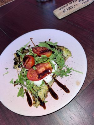 Yummy vegan chickpea slice :)) with vegan cheese, rocket and tomato. So yum!   at Life's a Peach in Utrecht