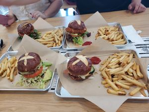 Cowboy burger, jerk burger, buffalo chicken and portobello burger at The Modern Vegan in San Diego