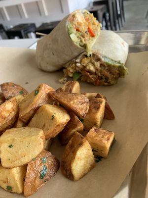 Breakfast burrito with yummy potato’s  at The Modern Vegan in San Diego