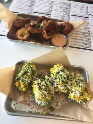 Stuffed avocado and onion rings at The Modern Vegan in San Diego
