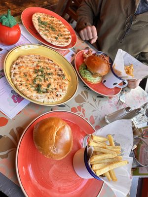 Beyond burgers with chip as well as garlic and chilli flat bread  at Lounges - Clio Lounge in Bangor