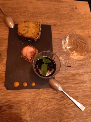 Vegan panna cotta, fruit sorbet, and carrot cake at La Cabane  in Annecy