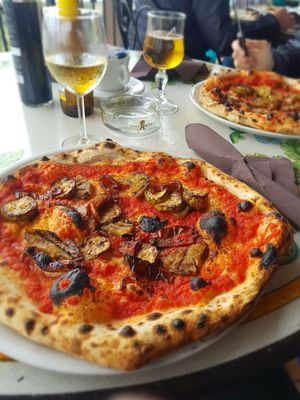 Vegetarian pizza without cheese. The dough was really good. at Bar Ingrid in Stromboli