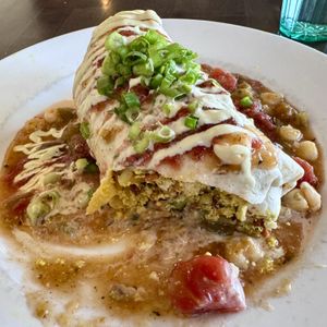The breakfast burrito with avocado and green chili was delicious.   at Cafe 13 in Golden