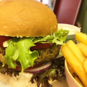 Delicious homemade vegan burgers, fresh salad, homemade vegan ‘slaw, fries cooked in dedicated vegetable oil. Yum. at Delphine's Diner in Aldeburgh
