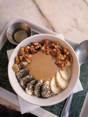 Oat meal with peanut butter, nuts, banana and Chia seeds at La Masala Cafe in Barcelona