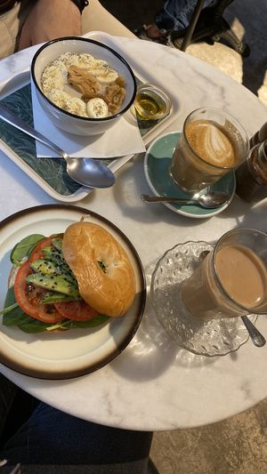 Hummus Avocado Bagle and Banana Peanut Butter Porridge at La Masala Cafe in Barcelona