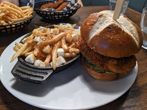 "Chicken" burger and Poutine at Bowhead Pub in Montreal