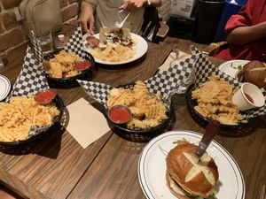 Captain burgers, waffle fries and po boy sandwich  at Bowhead Pub in Montreal