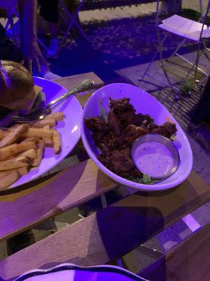 Buffalo wings and burger  at Bowhead Pub in Montreal