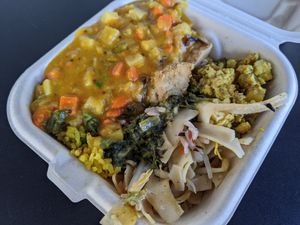 My sampler was about $8.38 (10.99/lb) and fairly filling. Veggie daal (delicious!) over wild rice and curry fried rice, Korean tofu (good), mock chicken (good), spinach luau (good) at Down to Earth - Store and Deli in Honolulu