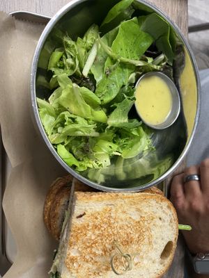 Pesto chicken sandwich with side salad   at Sea Salt Healthy Kitchen in St Simons
