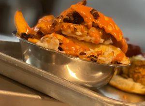 Potato wedges with our special Ginzo sauce  at Plant Based Mafia in Palm Beach Gardens