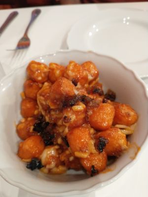 Sweet tots with an amazing sauce and plant based cheese. I wasn't sure what to expect but was blown away by the amazing flavors. at Plant Based Mafia in Palm Beach Gardens