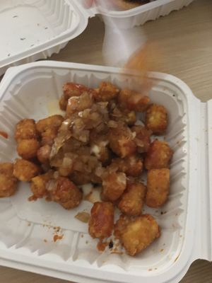 Tater Tots with caramelized onions and cheese  at Plant Based Mafia in Palm Beach Gardens