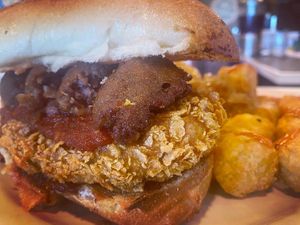 Chicken meatball hoagie with tots  at Plant Based Mafia in Palm Beach Gardens