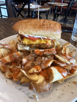 Chikn sandwich and the potato wedges are 🔥  at Plant Based Mafia in Palm Beach Gardens