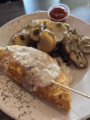 Vegan Meat Lovers Omelette with Potatoes 🥔   at Plant Based Mafia in Palm Beach Gardens