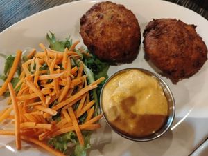 Crab cakes appetizer at Plant Based Mafia in Palm Beach Gardens