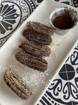 All vegan Chocolate churros with chocolate sauce! at Charro Vida in Tucson