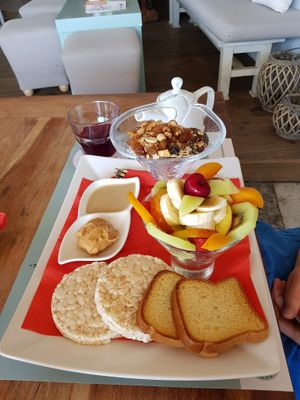 Vegan breakfast - lots of fresh fruit, museli, tahini at Meltemi Brunch Cafe in Skiathos